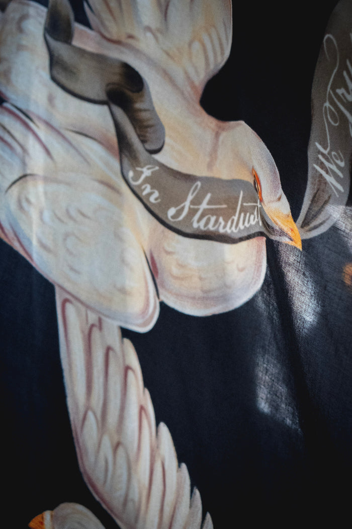 Model wearing the original Market of Stars kimono featuring Victorian-inspired doves and the words “In Stardust We Trust” — a tribute to dreams and possibility – Market of Stars.