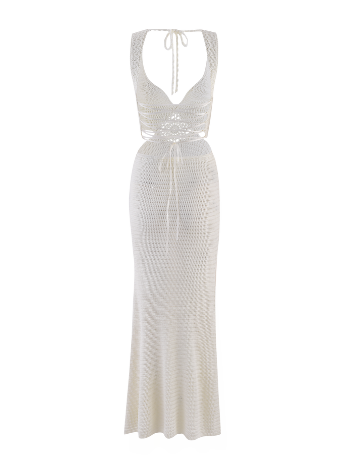 The JONAH MAXI DRESS by TIGERMIST is a sleeveless cream crochet maxi with a plunging neckline, halter straps, fitted waist, front tie detail, and a semi-sheer diamond crochet pattern for an elegant bodycon fit.