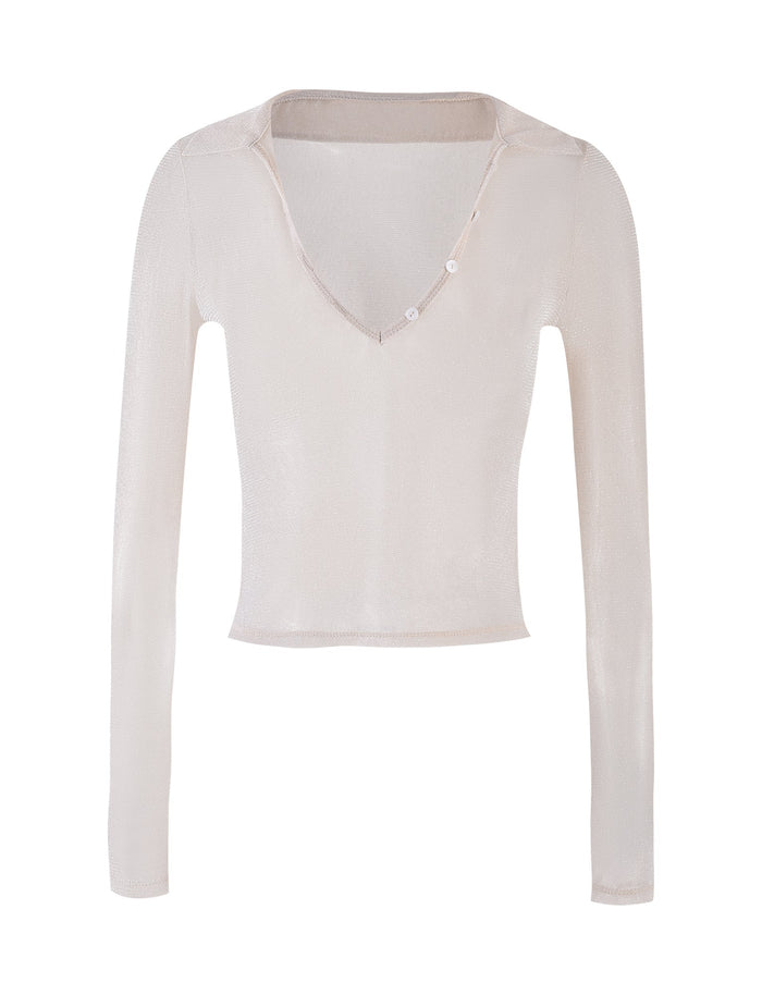 The TIGERMIST JOSIAS TOP in White Cream is a light beige, long-sleeve, V-neck blouse with a semi-sheer texture. This slightly cropped top features small buttons along one shoulder seam and is made from lightweight, slightly shiny fabric.