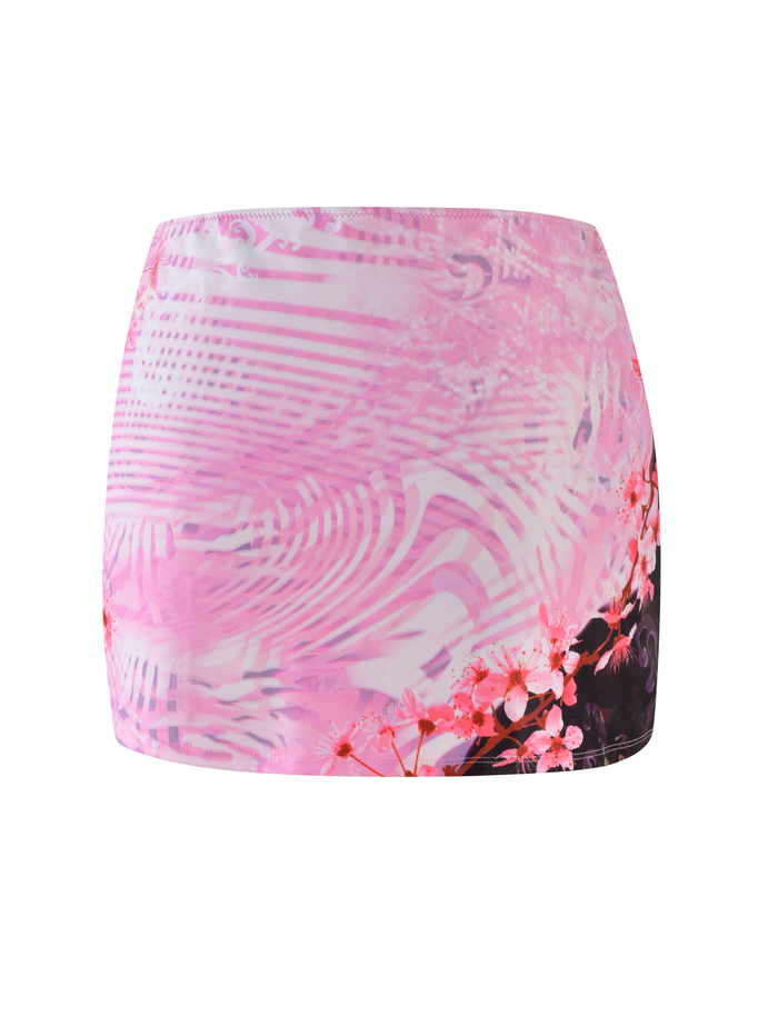 The JOVANNA MINI SKIRT by TIGERMIST features a multi-colored animal print with a floral border, designed in an A-line fit for a playful, feminine look.