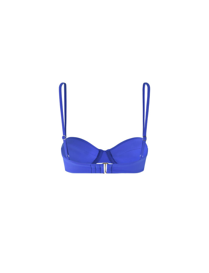 A TIGERMIST KHESSA Bikini Top in cobalt blue, featuring thin, adjustable shoulder straps and underwire support. The top includes a front clasp with seam lines on the cups for added structure. The fabric is smooth and slightly shiny, giving it a sleek appearance.