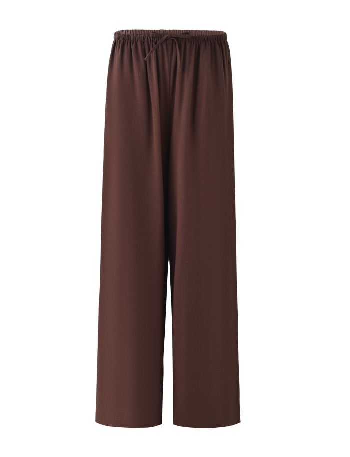 The TIGERMIST LAINEY PANT in chocolate features a loose fit, mid-rise, straight-leg design with an elasticated waist, shown against a plain background.