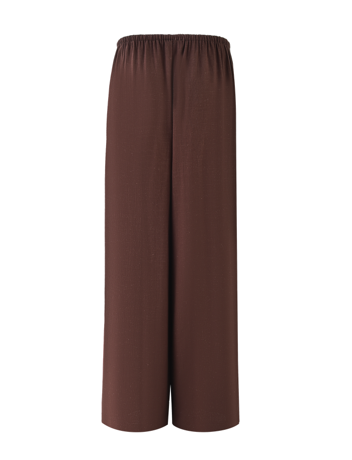 The LAINEY PANT - CHOCOLATE by TIGERMIST features a wide-leg linen design in brown with an elasticated waist, shown against a light background. The lightweight, flowy fabric offers effortless style.