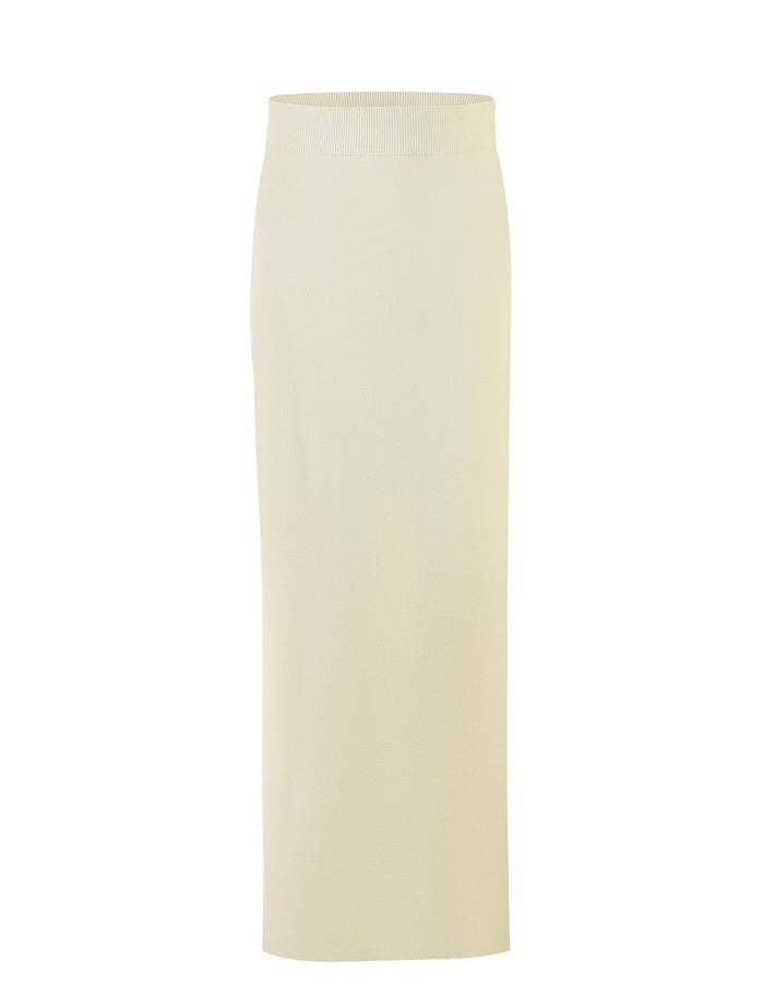The TIGERMIST LEDGER SKIRT in white and cream is a high-waisted, knee-length pencil skirt made from a smooth, stretchy fabric. This piece features a clean and simple design with no visible zippers, buttons, or embellishments.