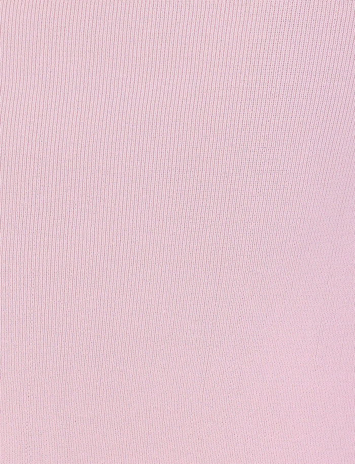 Close-up of the fabric texture of the LILYANA SKIRT in baby pink by TIGERMIST, perfect for a relaxed fit midi skirt. It features fine vertical lines and a soft, subtle pattern. The material appears smooth and uniform, accentuating the delicate intricacies of the weave.