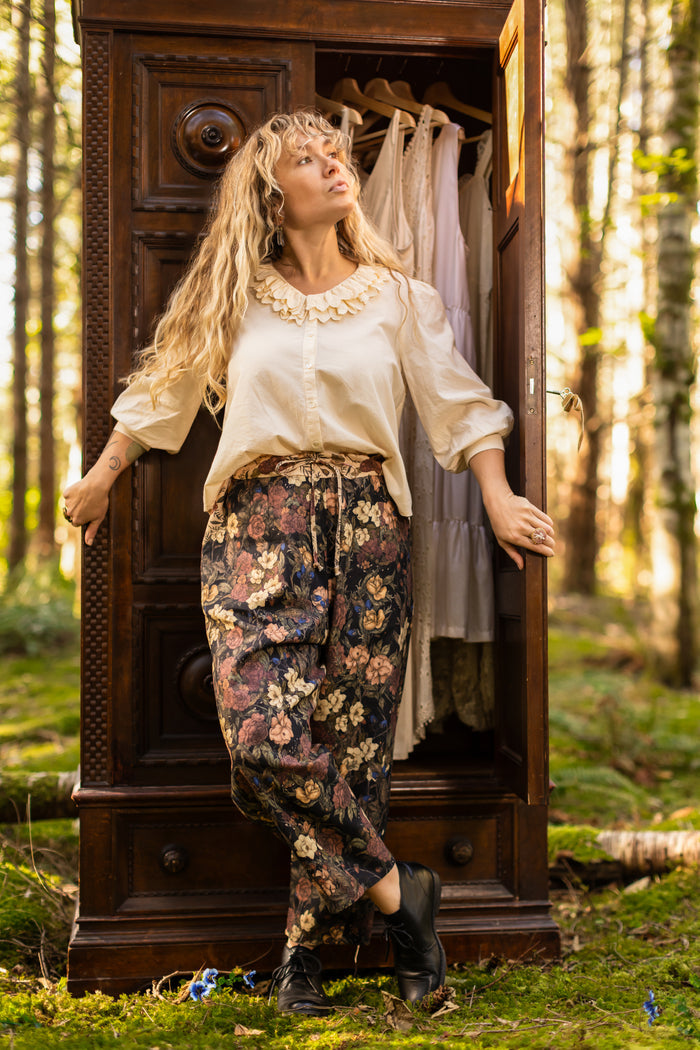 Model wearing a linen viscose blend cropped pant ft. artwork by artist & illustrator Jessica Roux - Market of Stars
