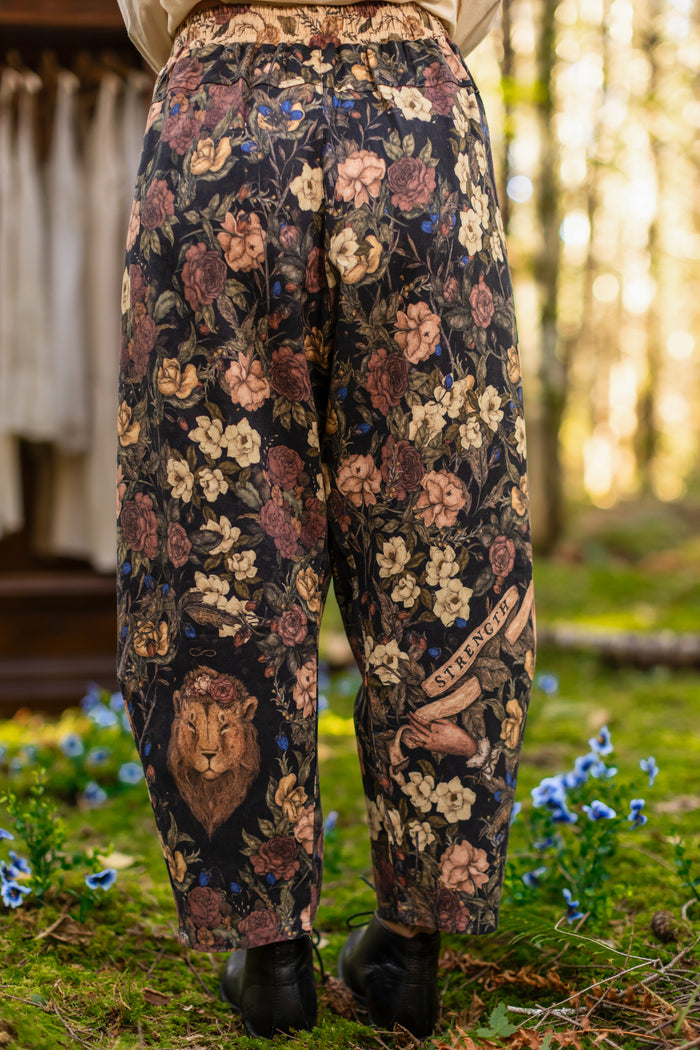Model wearing a linen viscose blend cropped pant ft. artwork by artist & illustrator Jessica Roux - Market of Stars