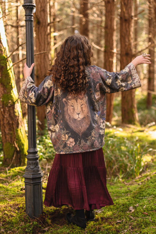 Model wearing the Lionheart Cottage Cardigan ft artwork by illustrator Jessica Roux - Market of Stars