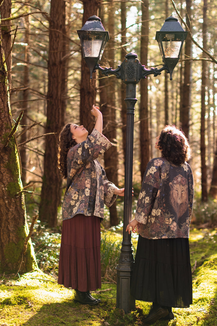Model wearing the Lionheart Cottage Cardigan ft artwork by illustrator Jessica Roux - Market of Stars