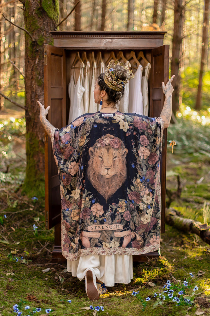 Model wearing a flowy bamboo-viscose duster ft. artwork by artist & illustrator Jessica Roux - Market of Stars