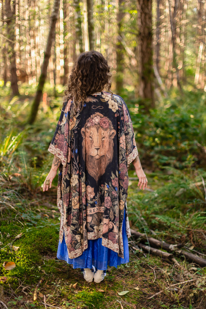 Model wearing a flowy bamboo-viscose duster ft. artwork by artist & illustrator Jessica Roux - Market of Stars