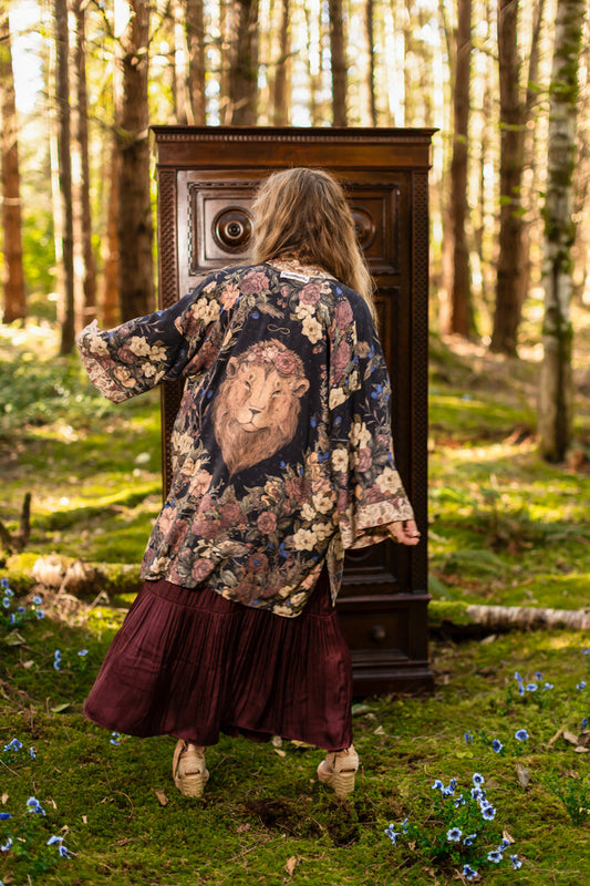 Model wearing a mid-length floral duster ft. artwork by artist & illustrator Jessica Roux - Market of Stars