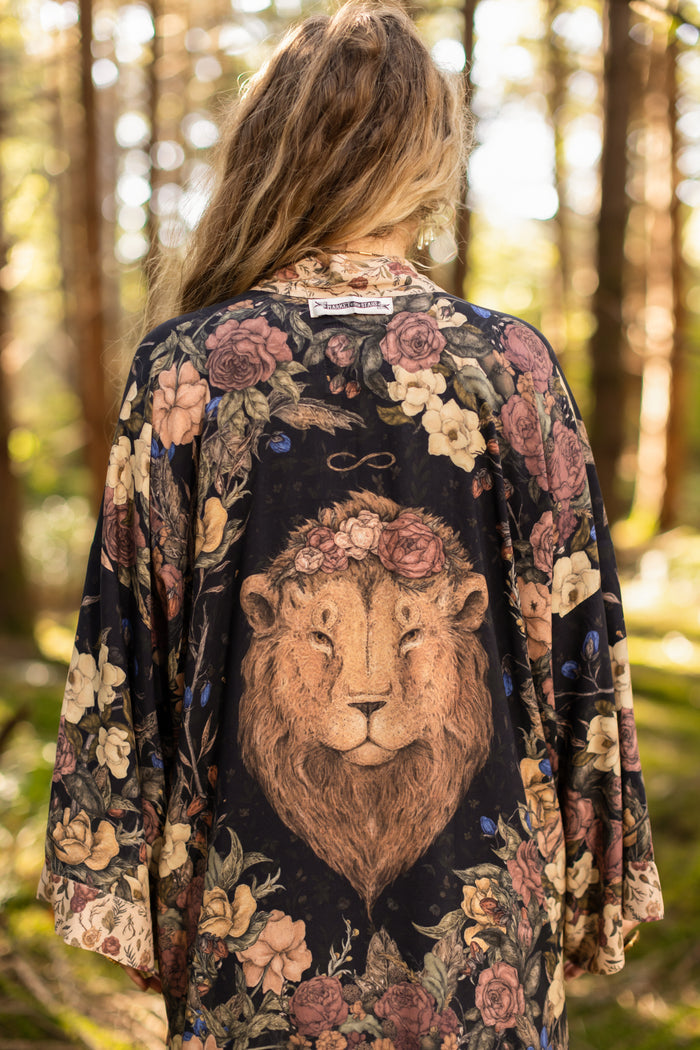 Model wearing a mid-length floral duster ft. artwork by artist & illustrator Jessica Roux - Market of Stars