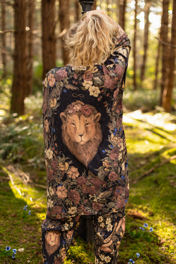 Model wearing a mid-length floral duster ft. artwork by artist & illustrator Jessica Roux - Market of Stars