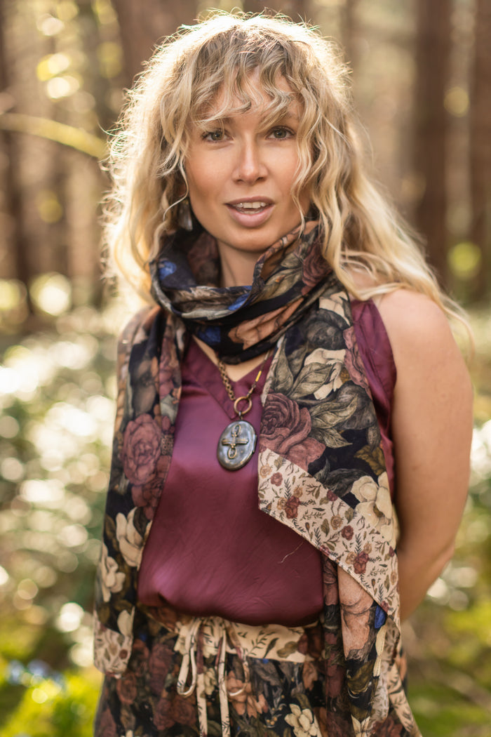 Model wearing a bamboo viscose scarf ft. artwork by artist & illustrator Jessica Roux - Market of Stars
