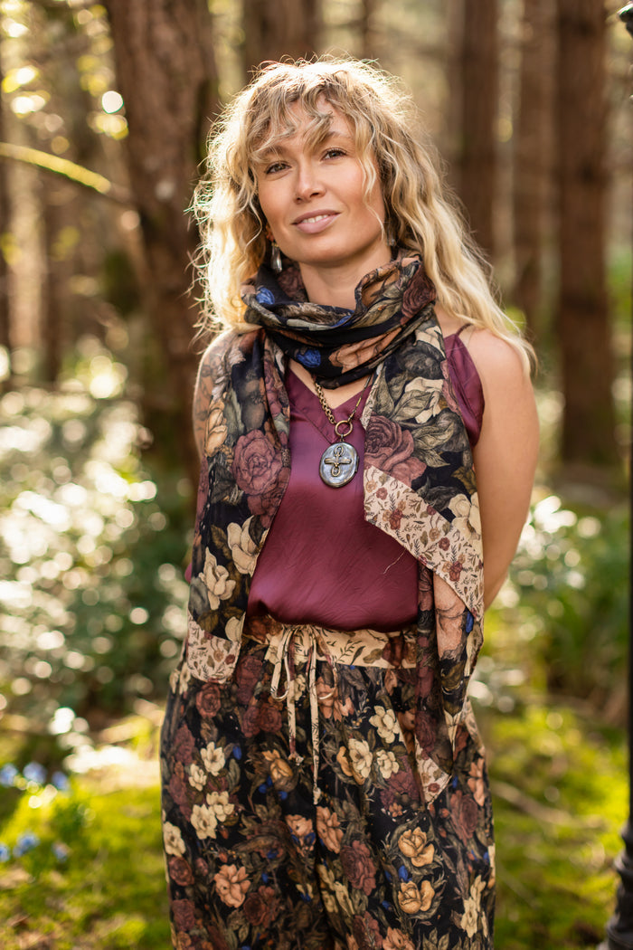 Model wearing a bamboo viscose scarf ft. artwork by artist & illustrator Jessica Roux - Market of Stars