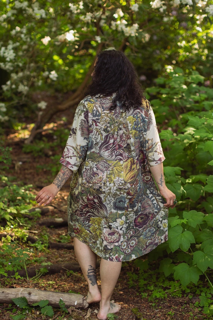 Model styled in Love Grows Wild Artist Dress featuring hand-coloured 1700s floral etchings and bumblebee detail – inspired by the French chemise – Market of Stars