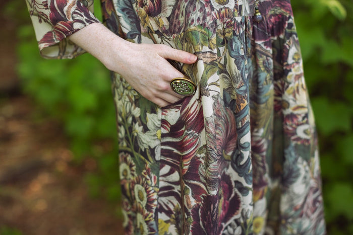Model styled in Love Grows Wild Artist Dress featuring hand-coloured 1700s floral etchings and bumblebee detail – inspired by the French chemise – Market of Stars