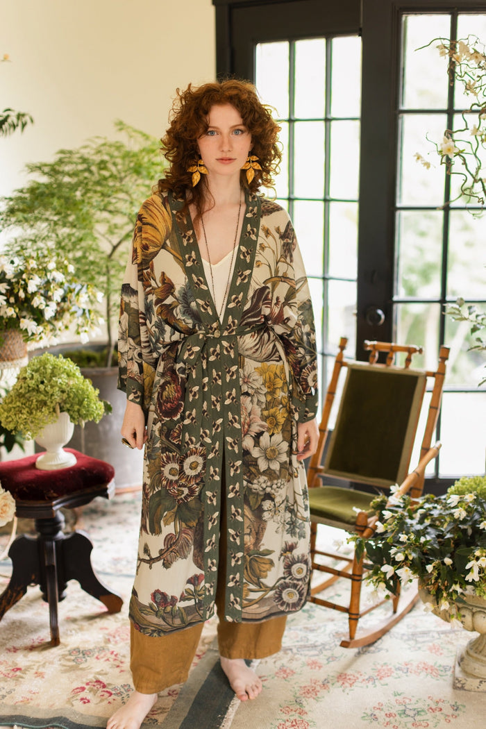 Model wearing kimono featuring 1700s March floral etchings and charming bumblebee trim inspired by vintage seed catalogues – Market of Stars.