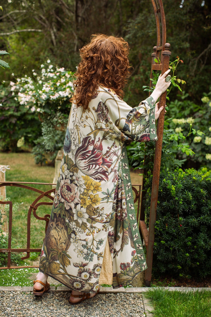 Model wearing kimono featuring 1700s March floral etchings and charming bumblebee trim inspired by vintage seed catalogues – Market of Stars.
