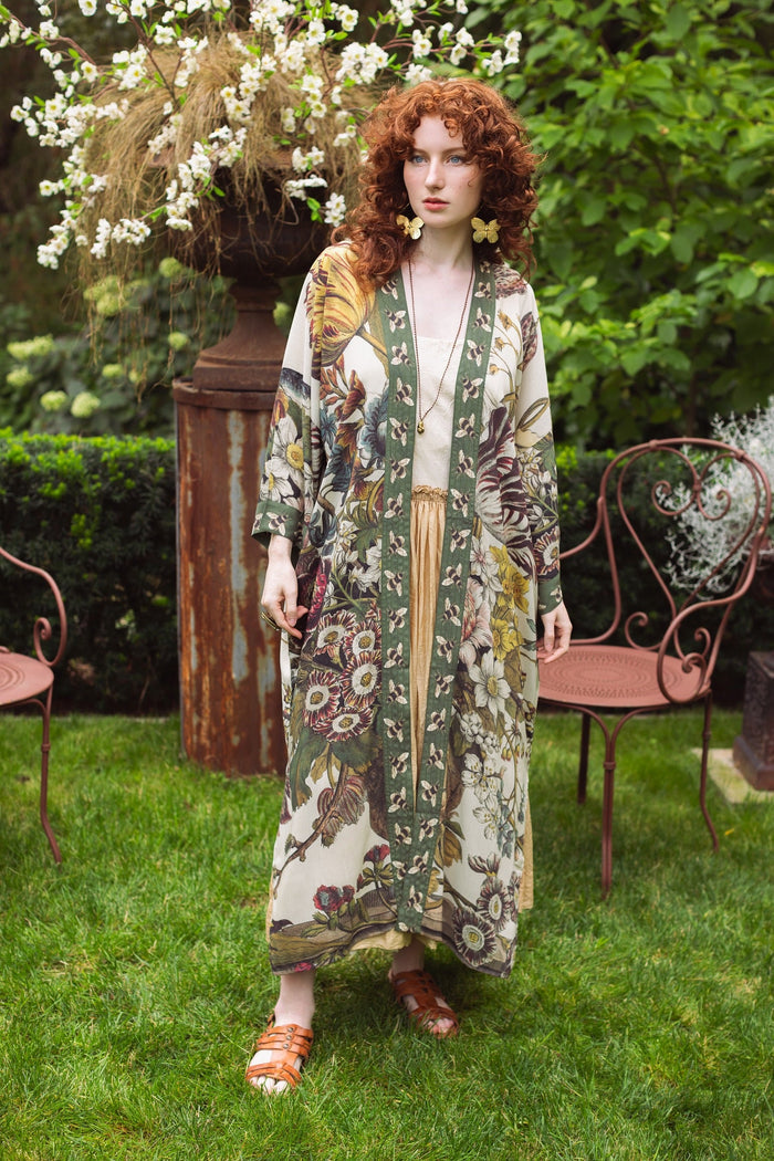 Model wearing kimono featuring 1700s March floral etchings and charming bumblebee trim inspired by vintage seed catalogues – Market of Stars.