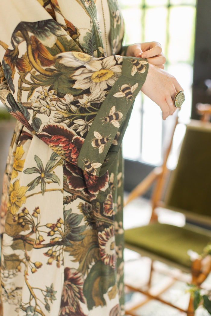 Model wearing kimono featuring 1700s March floral etchings and charming bumblebee trim inspired by vintage seed catalogues – Market of Stars.