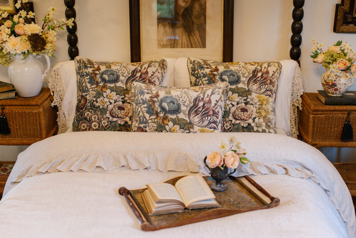 A soft cotton velvet cushion featuring lush 1700s botanical blooms - Market of Stars