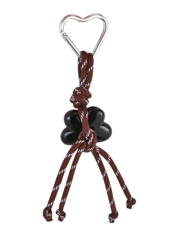 The TIGERMIST MIRIAM KEYCHAIN - CHOCOLATE features a heart-shaped carabiner on a brown paracord with white stripes, elegantly tied around a black paw charm, with four ends hanging down for a subtle sophisticated look.