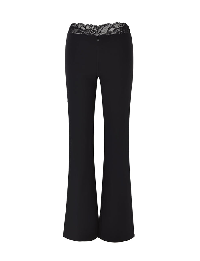 NYOMI PANT - BLACK by TIGERMIST, featuring flared legs and a lace-trimmed waistband, made from high stretch fabric, displayed on a white background.