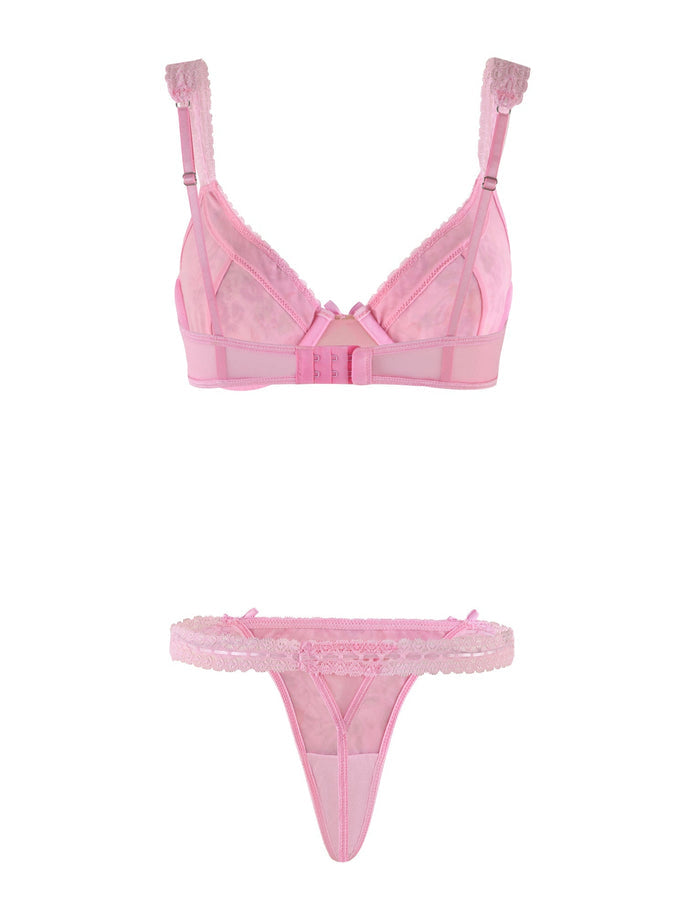 Introducing the PANDORA MESH SET - PINK: DELICATE FLORAL by TIGERMIST, a beautifully crafted pink lingerie set featuring a semi-sheer, lace-trimmed bra with adjustable shoulder straps and a hook-and-eye closure at the back. The set is completed with matching semi-sheer thong bottoms adorned with lace trim and delicate pink floral lace detailing.