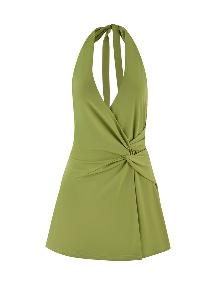 Introducing the PARRIS DRESS - GREEN by TIGERMIST: This vibrant green mini dress showcases a sleeveless, halter neck design with eye-catching twist detailing at the waist. Its V-neckline and slightly flared bottom bring an elegant touch to this stunning piece.