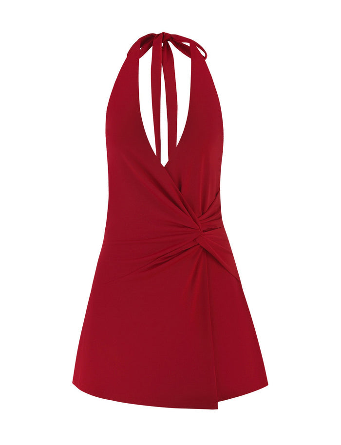 The PARRIS DRESS - RED by TIGERMIST is a sleeveless halter-neck mini with a deep red hue, plunging neckline, waist knot detail, and an asymmetric hem.