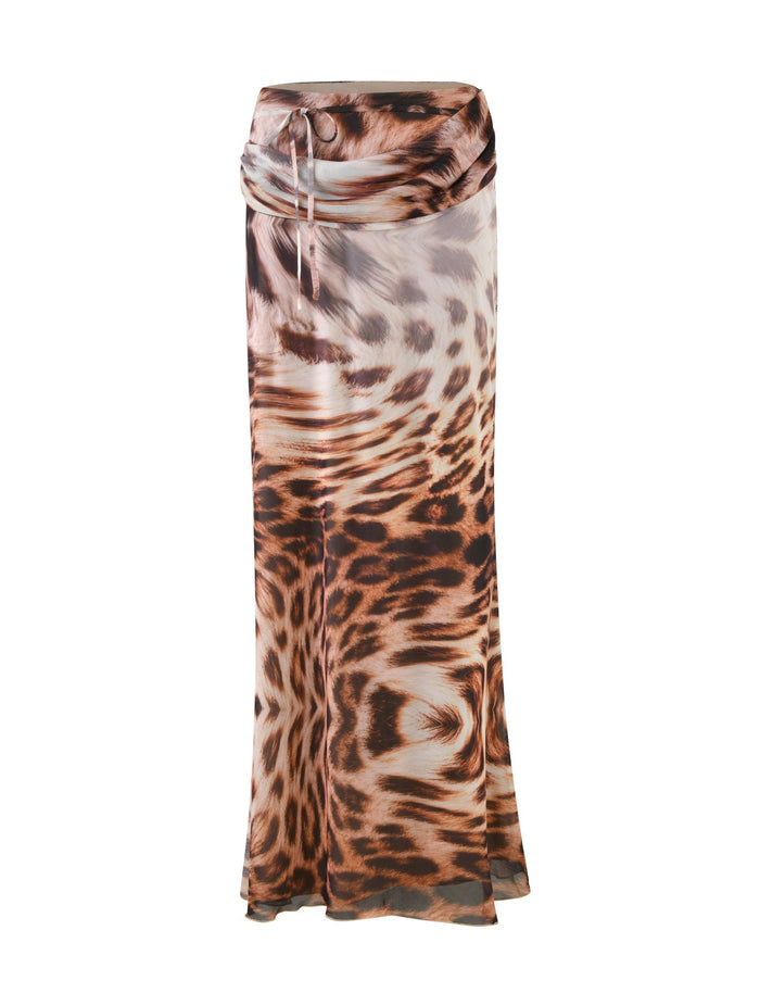 Introducing the PEARL MAXI SKIRT - NEUTRAL : LEOPARD : LEOPARD HAZE by TIGERMIST, a long and flowing masterpiece in a stunning leopard colorway. This skirt showcases an array of shades including brown, black, and tan for a chic and wild appearance. With its gathered waist and drawstring tie, it combines elegance with an untamed spirit effortlessly.