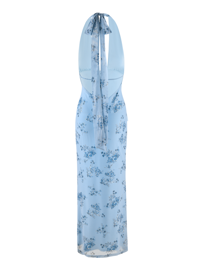 The TIGERMIST PHAEDRA MAXI DRESS in blue floral features a light blue halter neck, fitted waist, scattered blue and white flower patterns, a long flowing silhouette, and an elegant back tie.