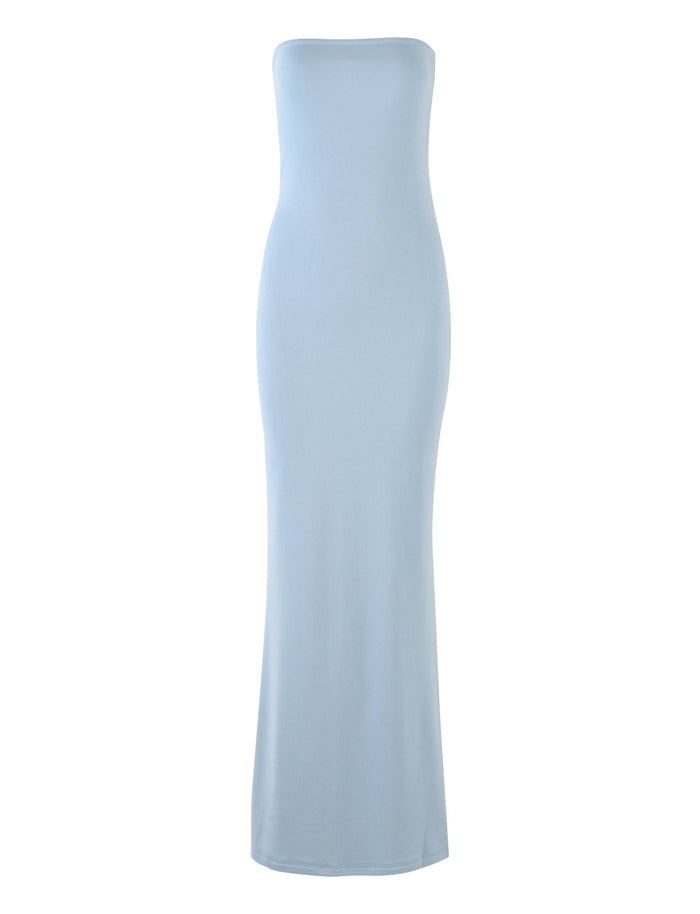 A snug-fitting, strapless, floor-length ROMINA DRESS by TIGERMIST in light blue. The smooth and stretchy fabric gives the dress a sleek and elegant appearance.