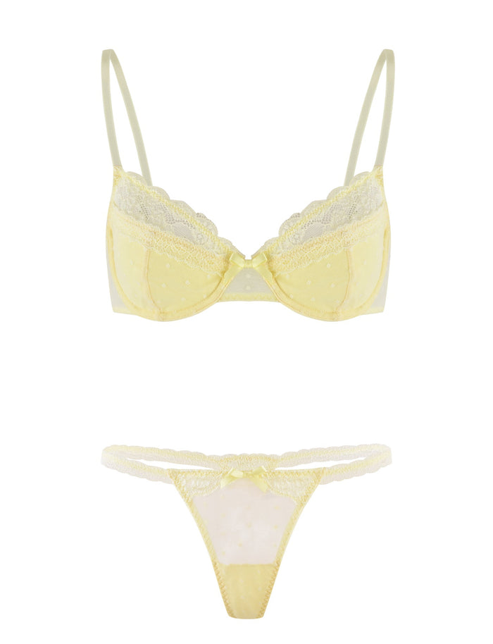 The SHAI SET - YELLOW : LEMON by TIGERMIST is displayed against a white background. This high stretch fabric ensemble includes an underwire bra with lace detailing and adjustable shoulder straps, and a matching thong with lace trim. Both pieces feature a subtle polka dot pattern.