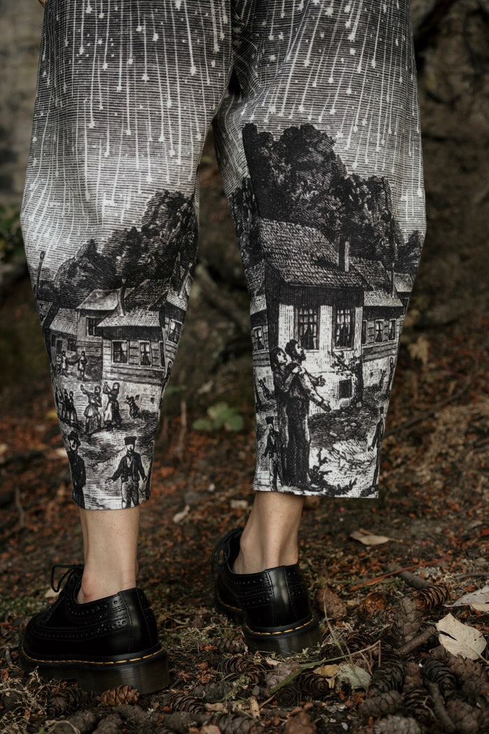 Model wearing Peace, Wine & Sunshine Bohéme Slip Dress featuring botanical collages and playful peace, wine and sunshine lettering on the hem – Market of Stars.