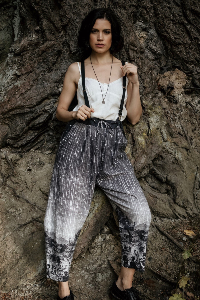 Model wearing Peace, Wine & Sunshine Bohéme Slip Dress featuring botanical collages and playful peace, wine and sunshine lettering on the hem – Market of Stars.