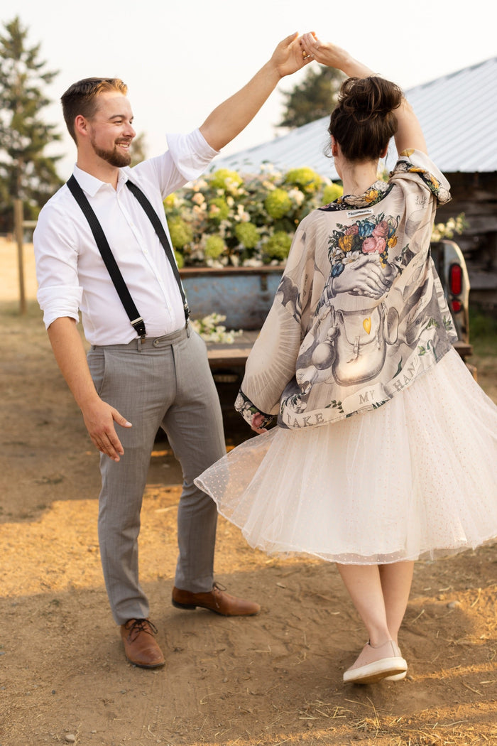 A joyful blend of 17th-century engravings, painted hearts, and hand-coloured florals on our cropped Take My Hand Pixie duster kimono – Market of Stars