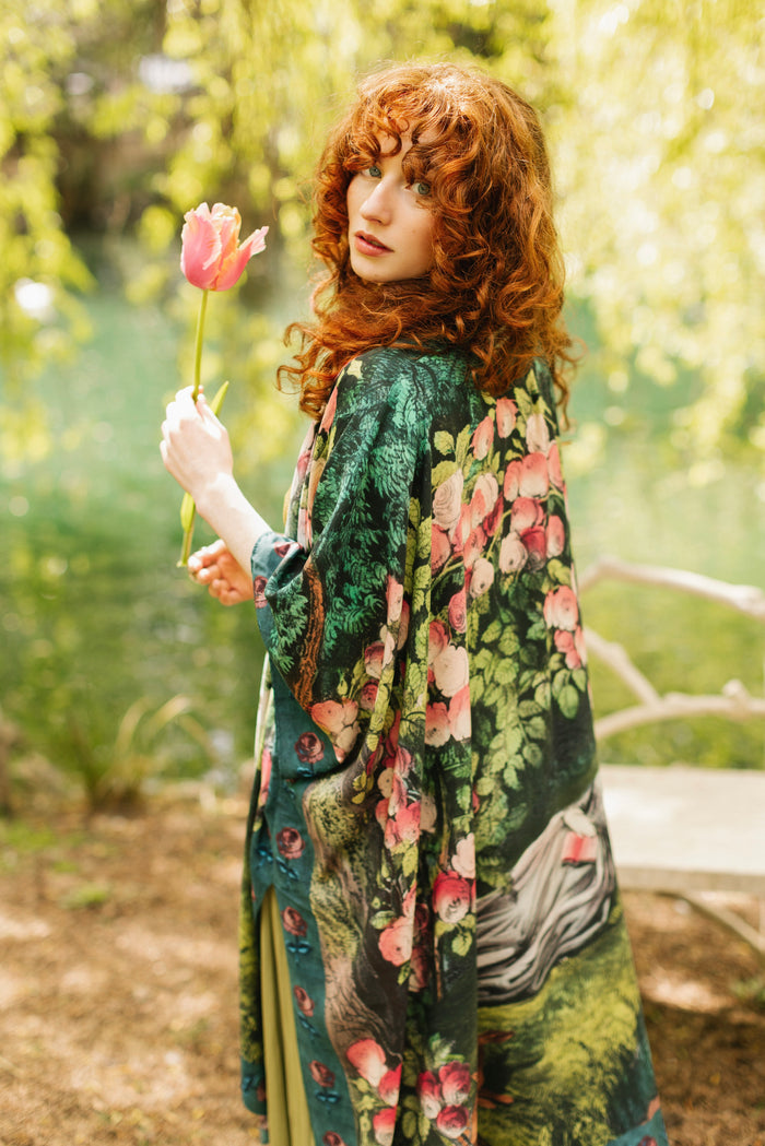 Model wearing a flowy duster ft. hand-coloured etching from the 1880s called The Bower of Roses - Market of Stars