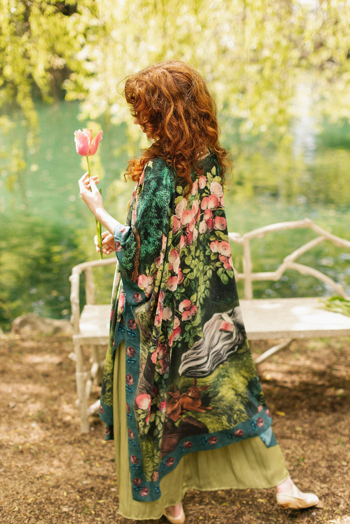 Model wearing a flowy duster ft. hand-coloured etching from the 1880s called The Bower of Roses - Market of Stars