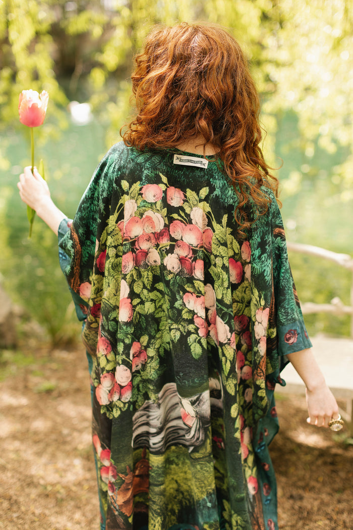 Model wearing a flowy duster ft. hand-coloured etching from the 1880s called The Bower of Roses - Market of Stars