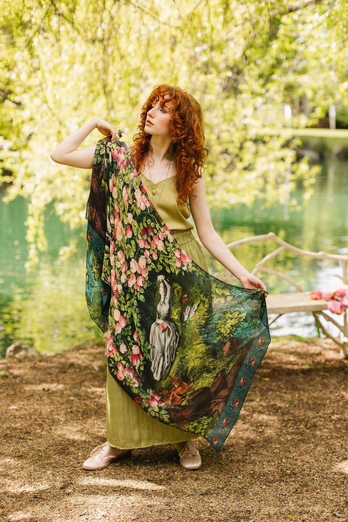 Model wearing a bamboo-viscose scarf ft. hand-coloured etching from the 1880s called The Bower of Roses - Market of Stars