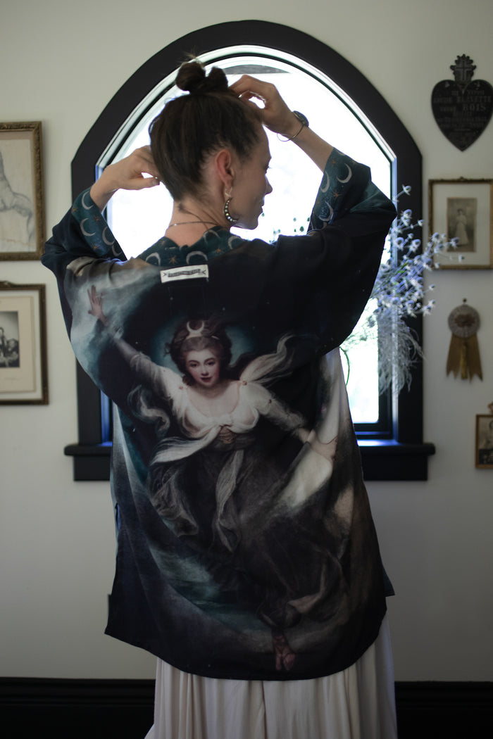 The Dreamer kimono jacket featuring a celestial Moon Goddess portrait with swirling sky detail and starry trim – Market of Stars