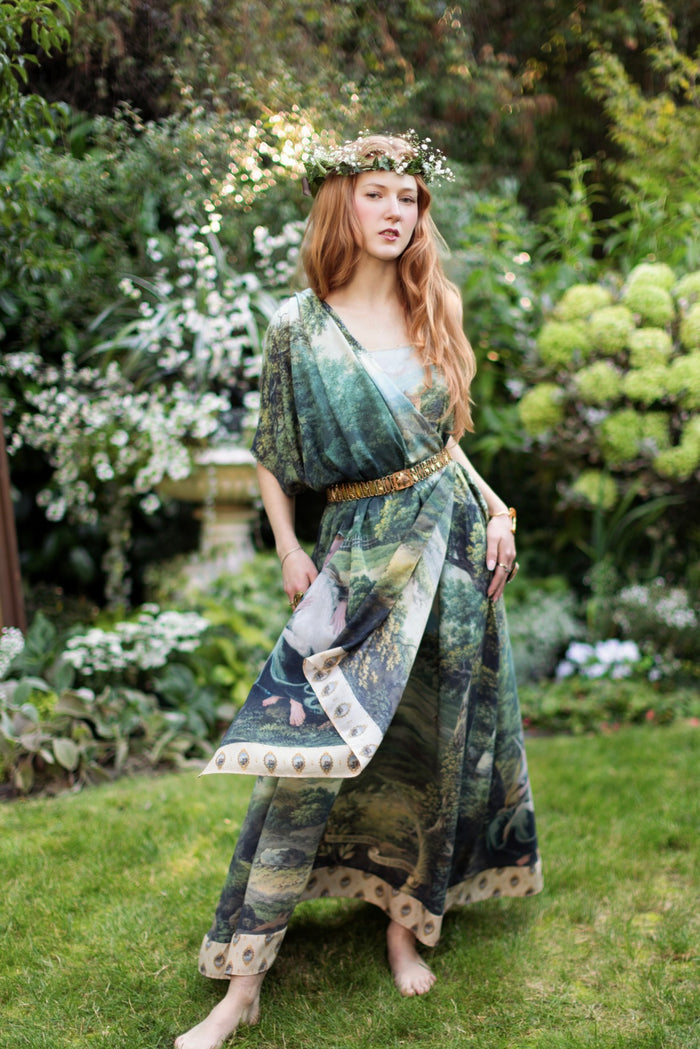 Model wearing a bamboo-viscose scarf ft. vintage artwork & unicorn lorn set against a mossy-green landscape — a romantic piece for the modern dreamer - Market of Stars