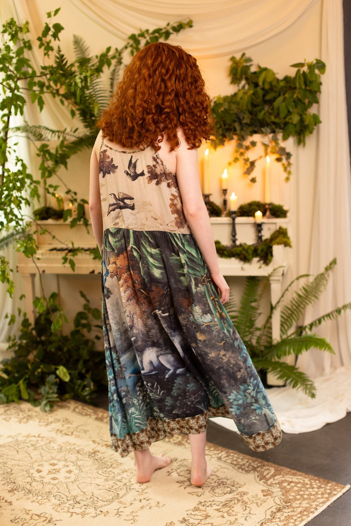 Model wearing our Theatre of Dreams Slip Dress featuring whimsical deer and birds from Jennifer Lanne’s romantic paintings – Market of Stars