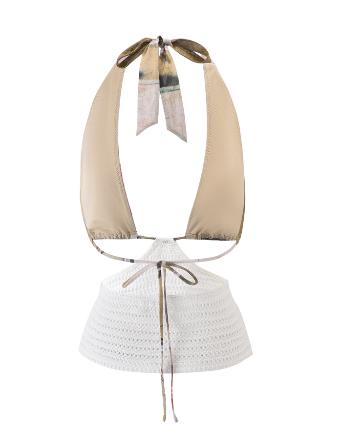The TILLEY TOP - ROSE POSTCARD by TIGERMIST is a beige halter bikini top with a brown neck tie, styled with a white crochet mini skirt with a brown waist tie, shown on a white background.