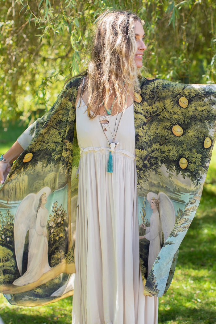 Model wearing Tree of Life Starduster celebrating growth renewal and timeless beauty – Market of Stars