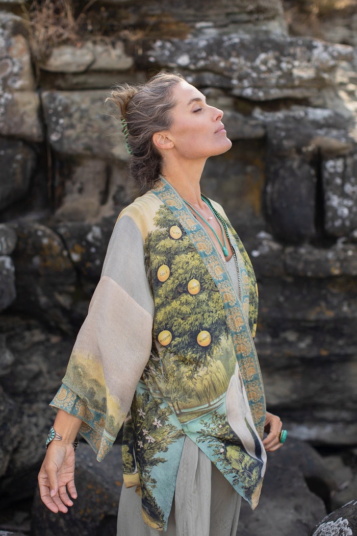 Model wearing Tree of Life Matinée Duster in aquas and verdant greens inspired by antique textiles – Market of Stars