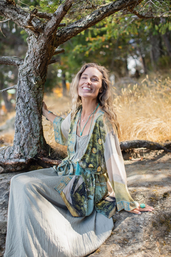 Model wearing Tree of Life Matinée Duster in aquas and verdant greens inspired by antique textiles – Market of Stars